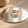 Gold eternity ring with princess-cut stones